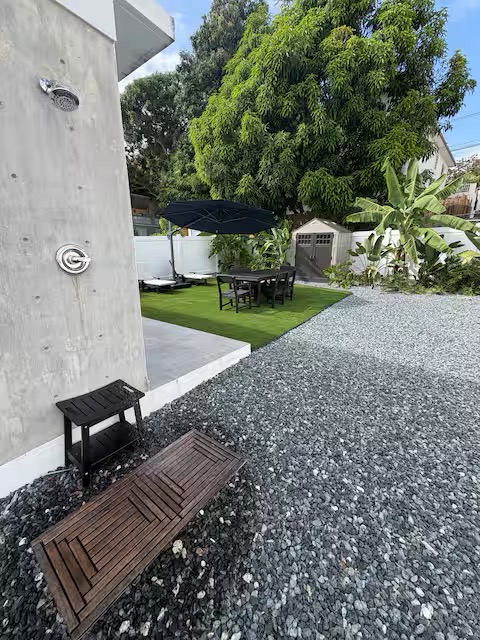 Private backyard oasis with outdoor shower